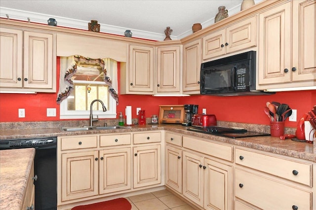  - kitchen with cream cabinets, a sink, light tile patterned floors, black appliances, and ornamental molding