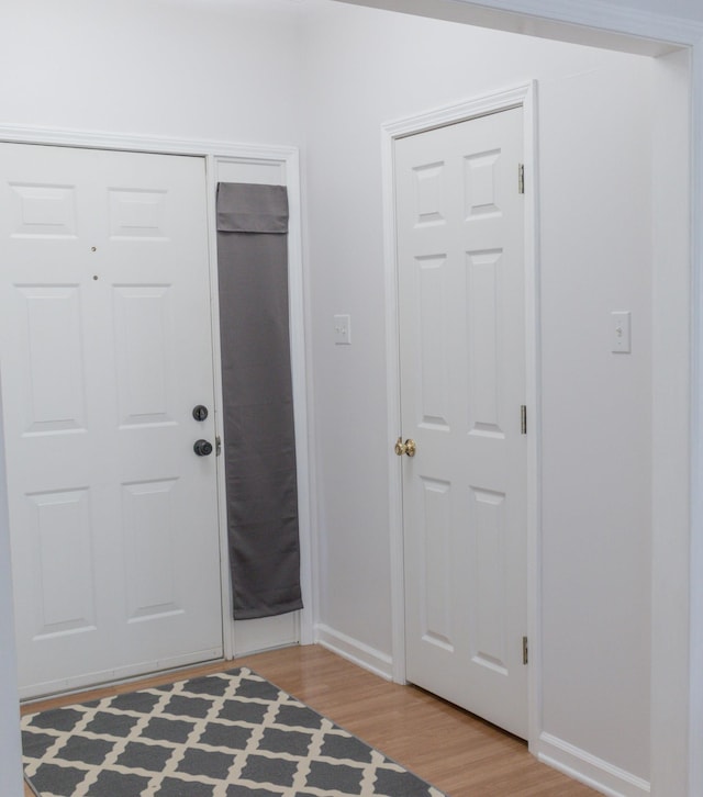 entryway with light wood-type flooring