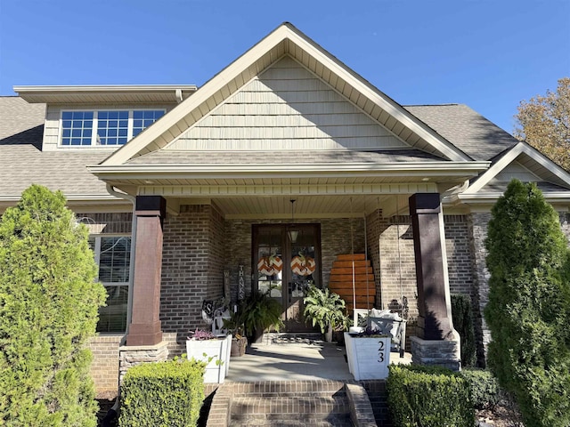 property entrance with covered porch