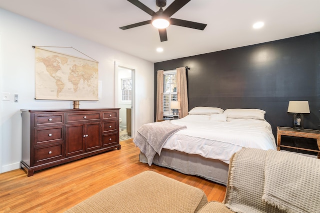 bedroom with recessed lighting, light wood-type flooring, a ceiling fan, and baseboards