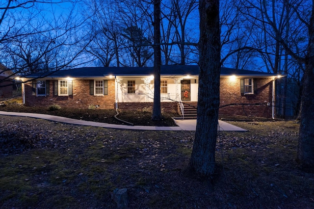 ranch-style home featuring crawl space and brick siding