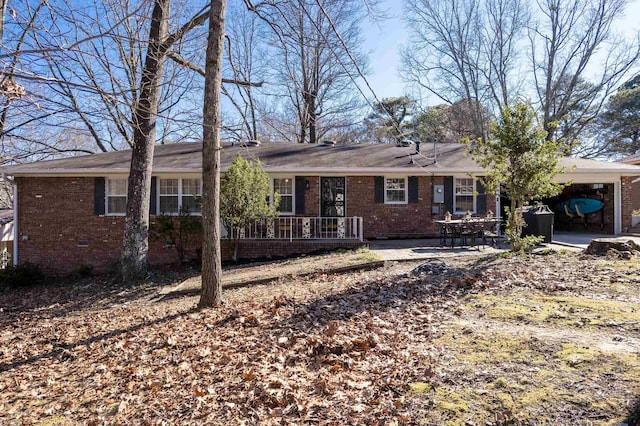 ranch-style home featuring crawl space and brick siding