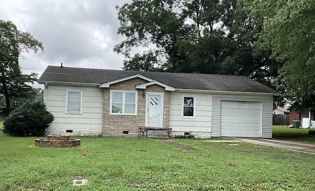 single story home with a garage and a front lawn