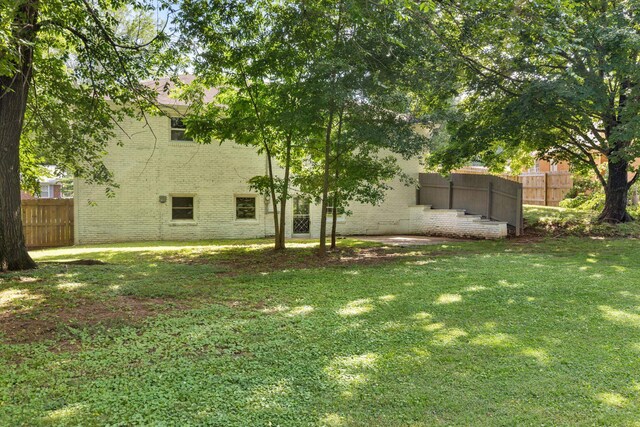  - view of yard with a patio