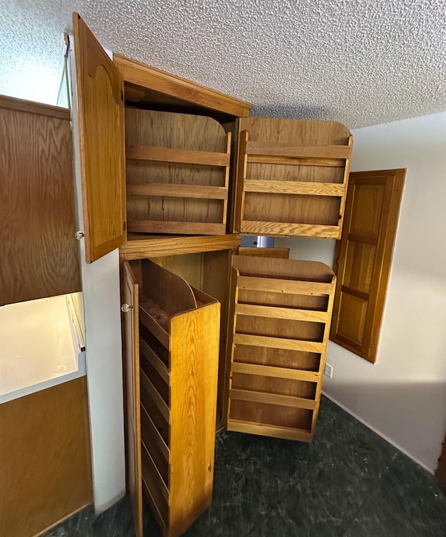 unfurnished bedroom featuring a textured ceiling