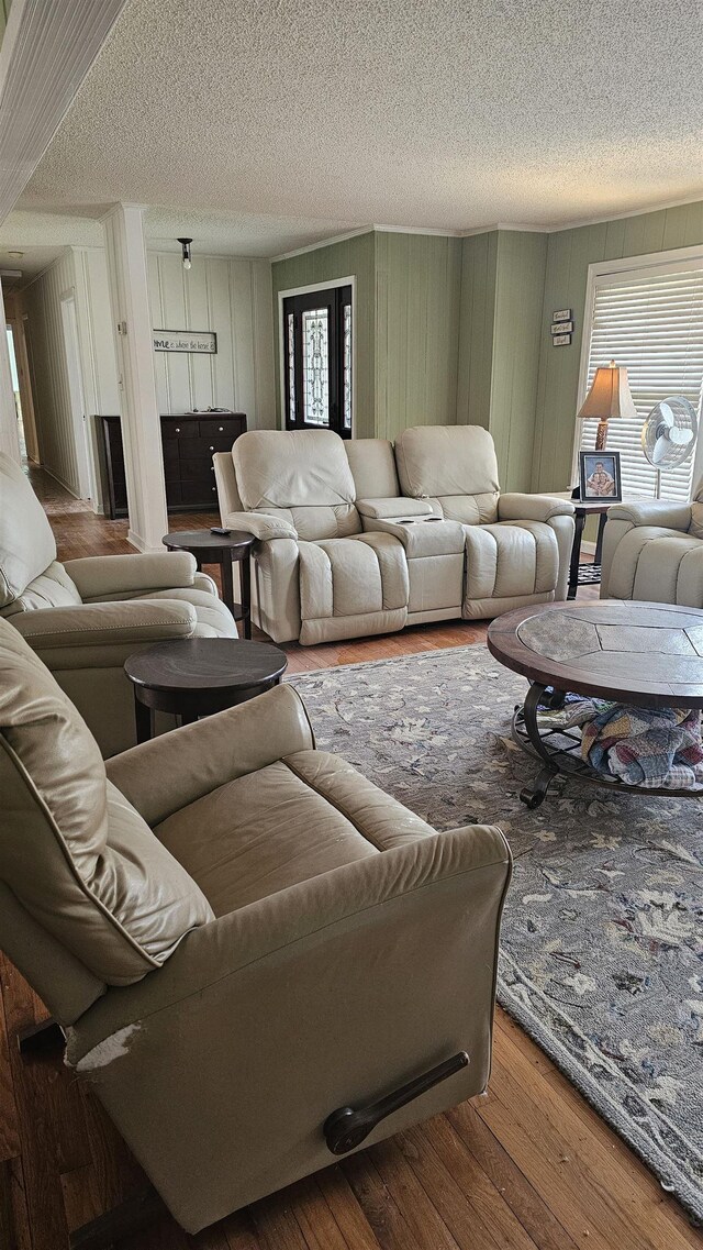 dining area featuring light hardwood / wood-style flooring and ornamental molding