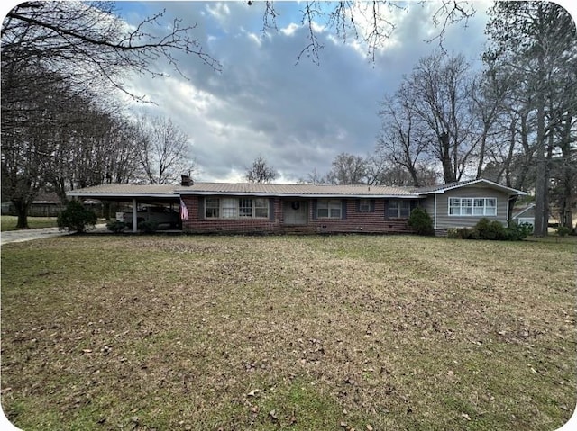 ranch-style home with a carport and a front lawn