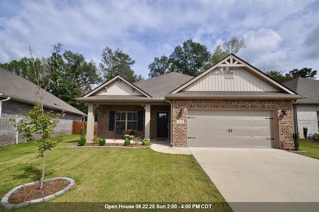  - craftsman inspired home with an attached garage, driveway, and brick siding