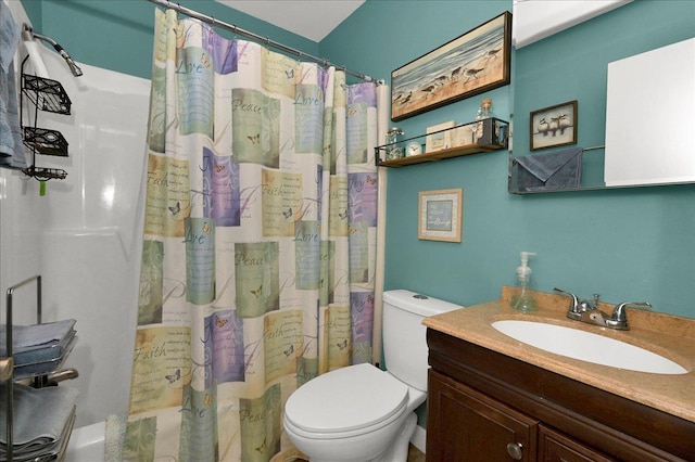  - bathroom featuring vanity and toilet