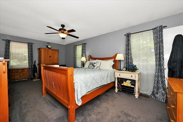  - bedroom featuring carpet and a ceiling fan