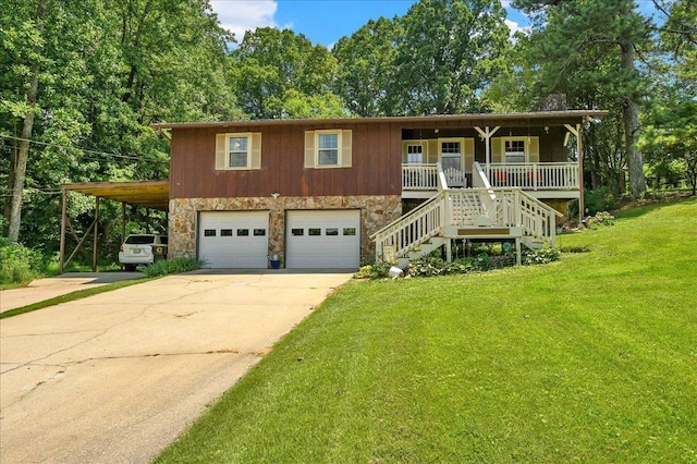  - view of front of home featuring stone siding, concrete driveway, a front yard, a porch, and stairs