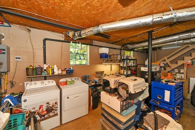  - below grade area with washing machine and dryer, stairway, and water heater