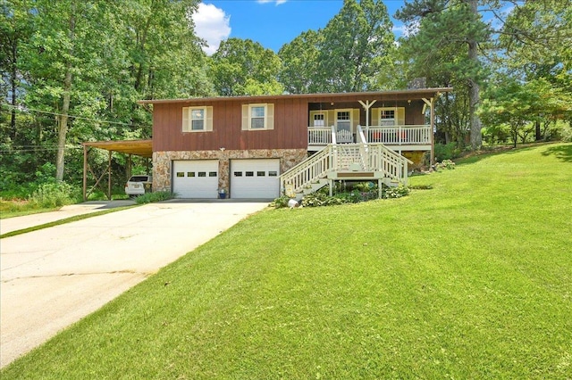  - view of front of home with covered porch, stone siding, stairs, concrete driveway, and a front lawn
