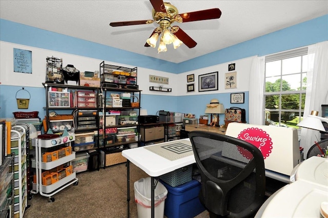  - office area with carpet and ceiling fan