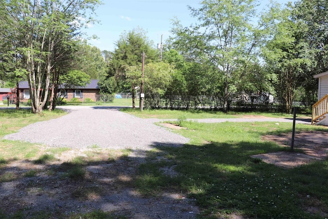  - surrounding community featuring a yard