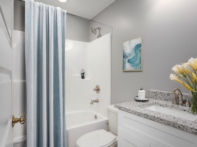 full bath featuring vanity, toilet, and shower / bathing tub combination