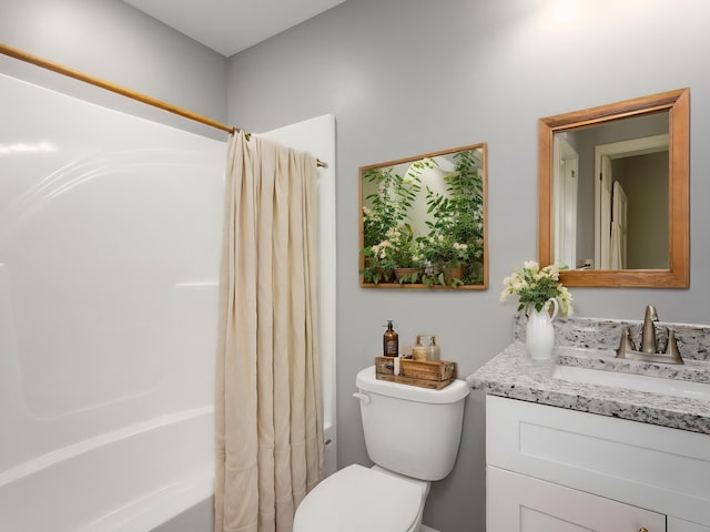 full bathroom featuring toilet, shower / bath combo, and vanity