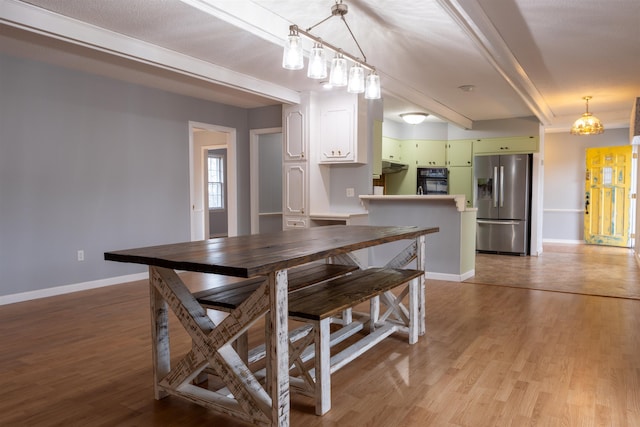 dining room featuring light hardwood / wood-style floors