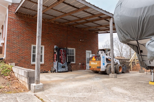 exterior space featuring a carport