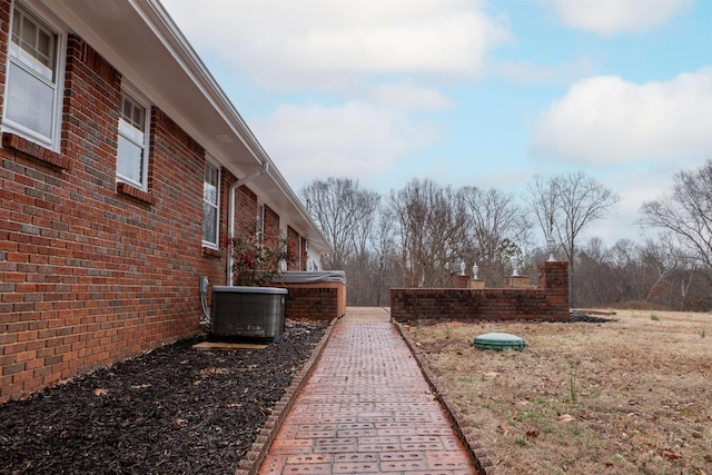 view of yard featuring central AC unit