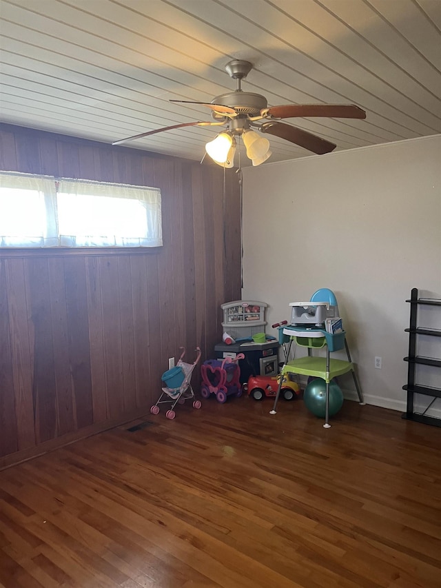 recreation room featuring wood finished floors and ceiling fan