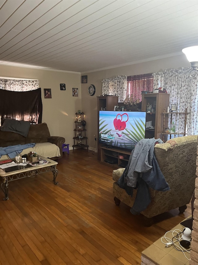 living area with wood ceiling, wood finished floors, and crown molding