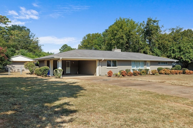 ranch-style home featuring a front yard and a carport