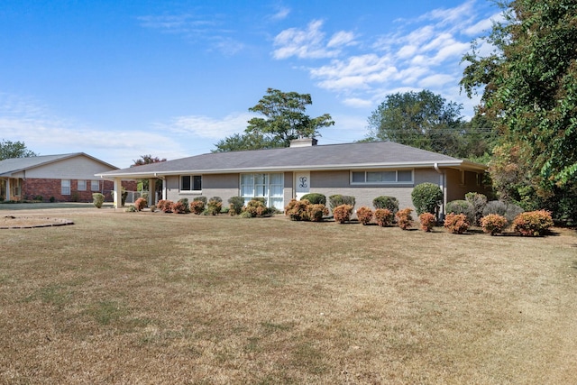 ranch-style house with a front yard