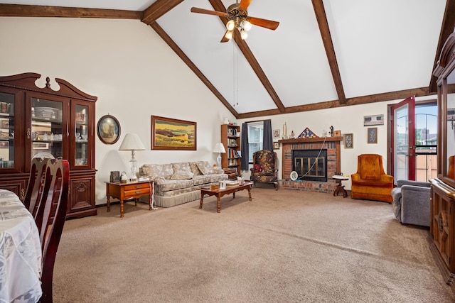 living room featuring ceiling fan, beamed ceiling, high vaulted ceiling, carpet floors, and a fireplace