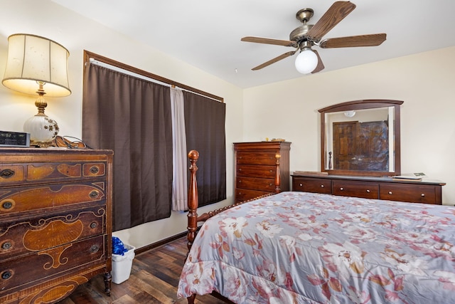 bedroom featuring ceiling fan and dark wood-type flooring