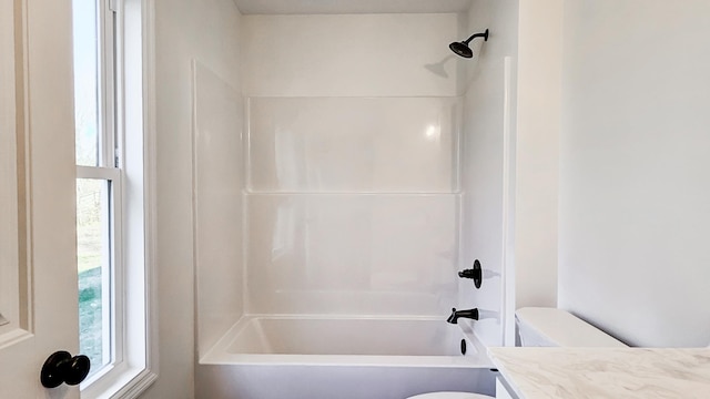 full bathroom with shower / bathtub combination, vanity, and toilet