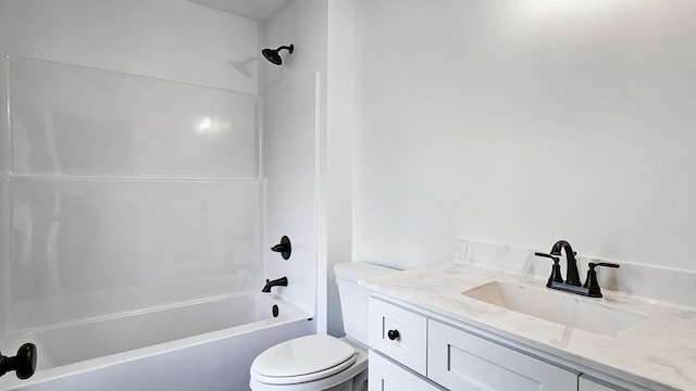 full bathroom with vanity, bathtub / shower combination, and toilet