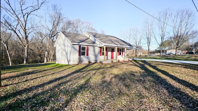 ranch-style house with a front lawn