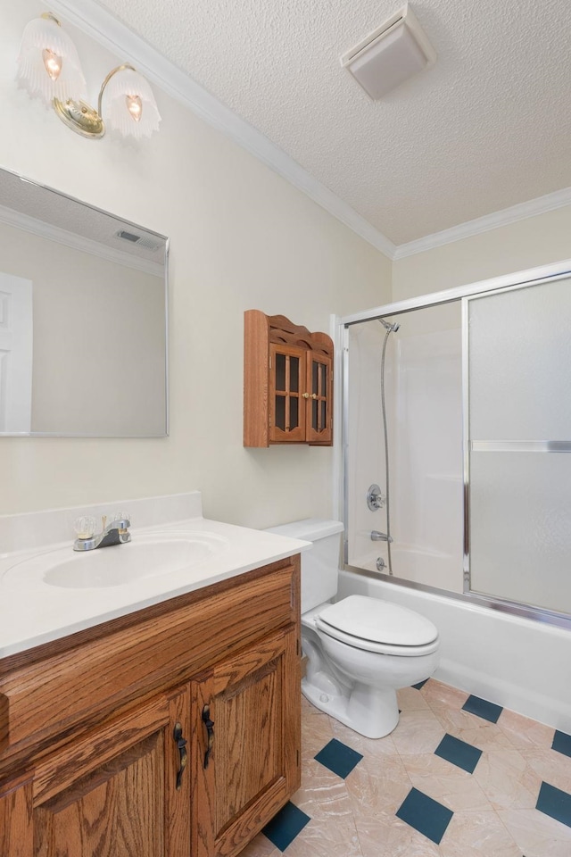 full bathroom featuring toilet, vanity, bath / shower combo with glass door, and a textured ceiling