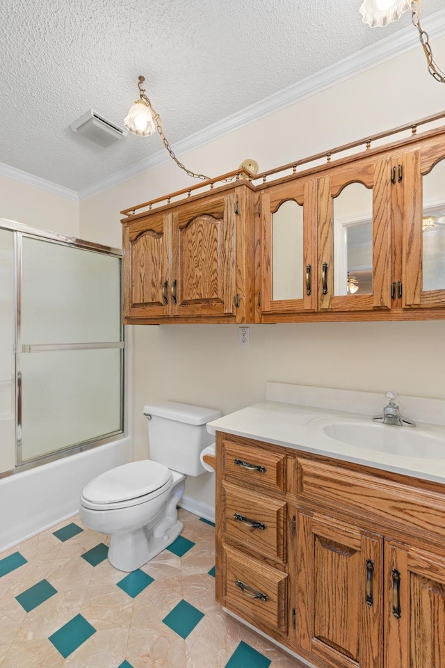 full bathroom with toilet, shower / bath combination with glass door, a textured ceiling, ornamental molding, and vanity