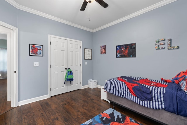 bedroom with ceiling fan, dark hardwood / wood-style flooring, and ornamental molding