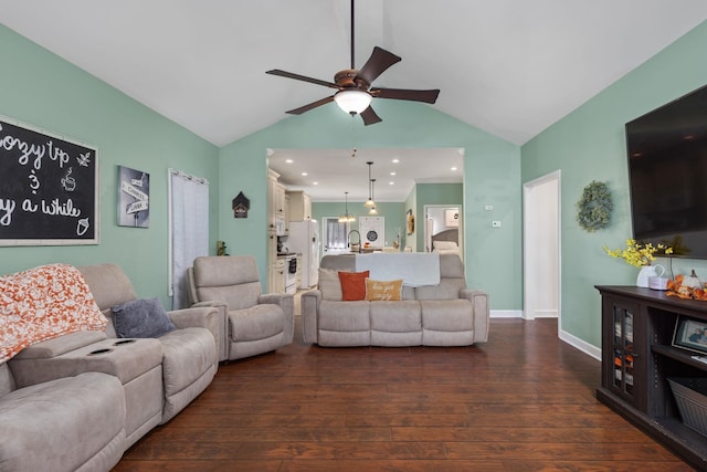 living room featuring lofted ceiling, ceiling fan, dark wood-type flooring, and sink