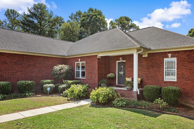 view of front of home with a front yard