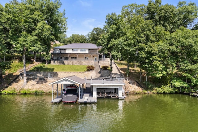 dock area featuring a water view and boat lift