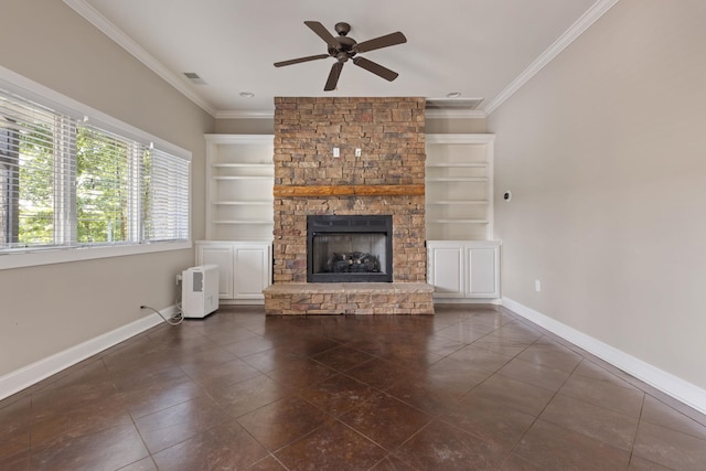 unfurnished living room featuring baseboards, built in shelves, visible vents, and crown molding