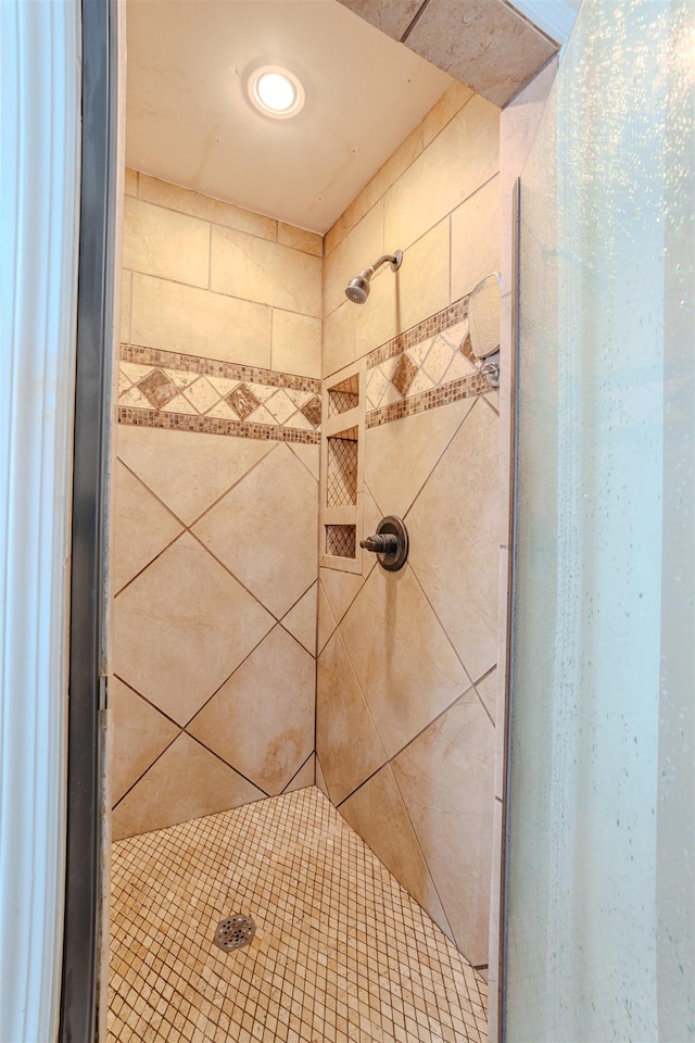 details featuring a tile shower