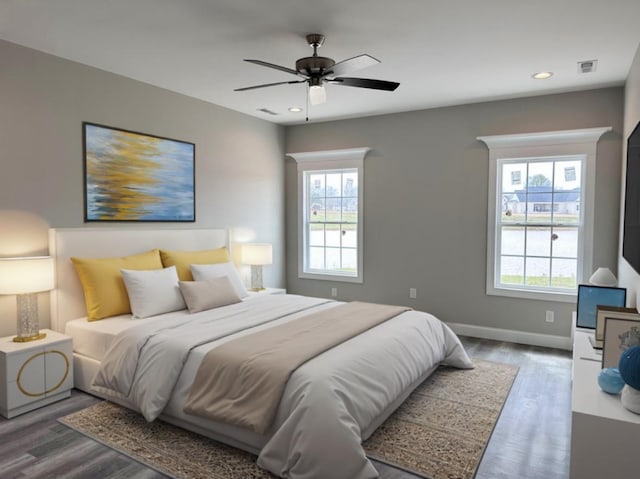 bedroom with dark wood-type flooring and ceiling fan