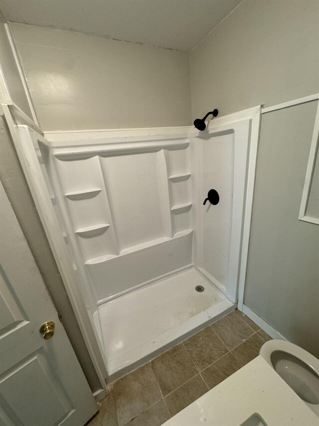  - full bathroom with a shower