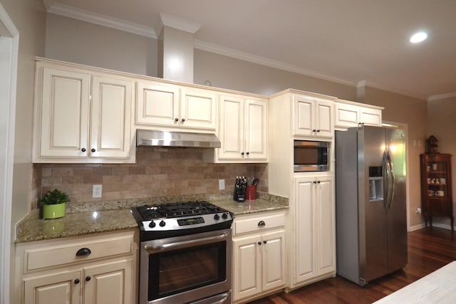 kitchen featuring ornamental molding, light stone counters, tasteful backsplash, dark hardwood / wood-style flooring, and stainless steel appliances