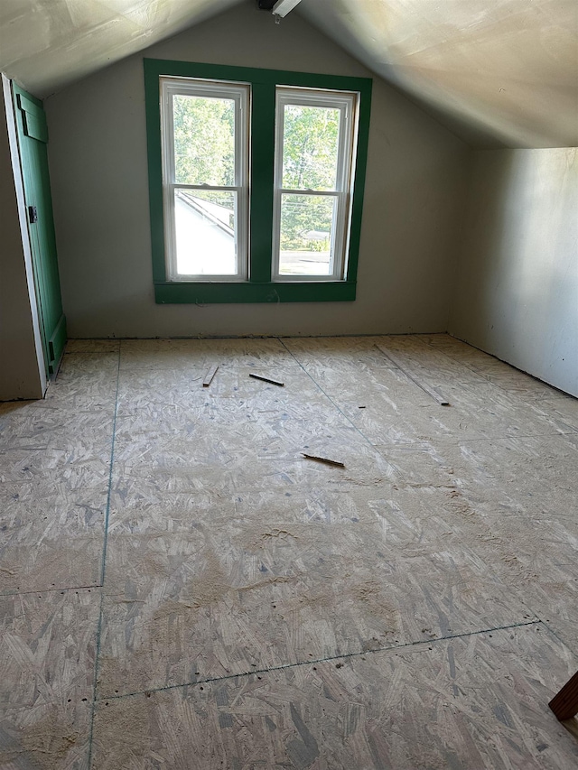 bonus room featuring vaulted ceiling