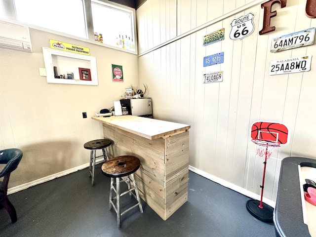 bar with a wall mounted AC and wood walls