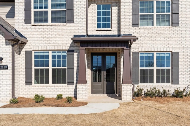 doorway to property featuring french doors