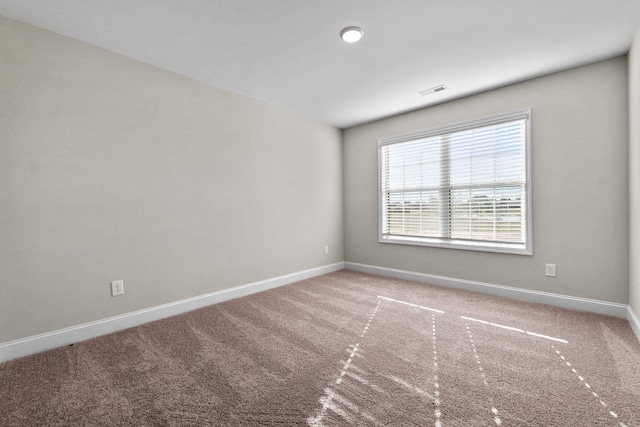 view of carpeted spare room