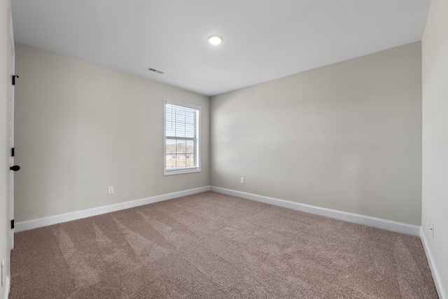 view of carpeted spare room