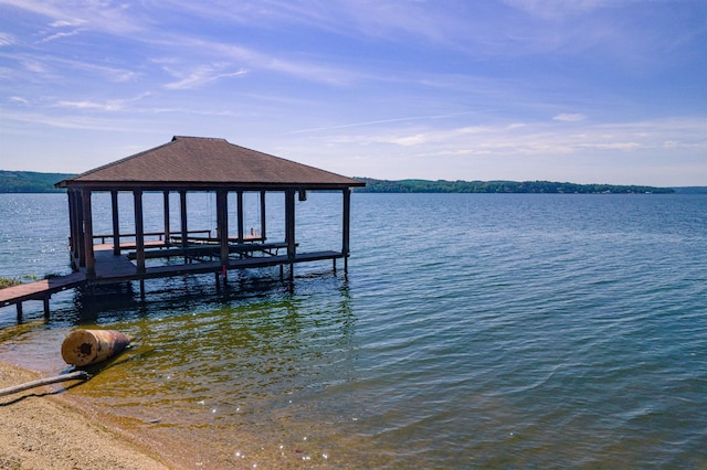 dock area featuring a water view